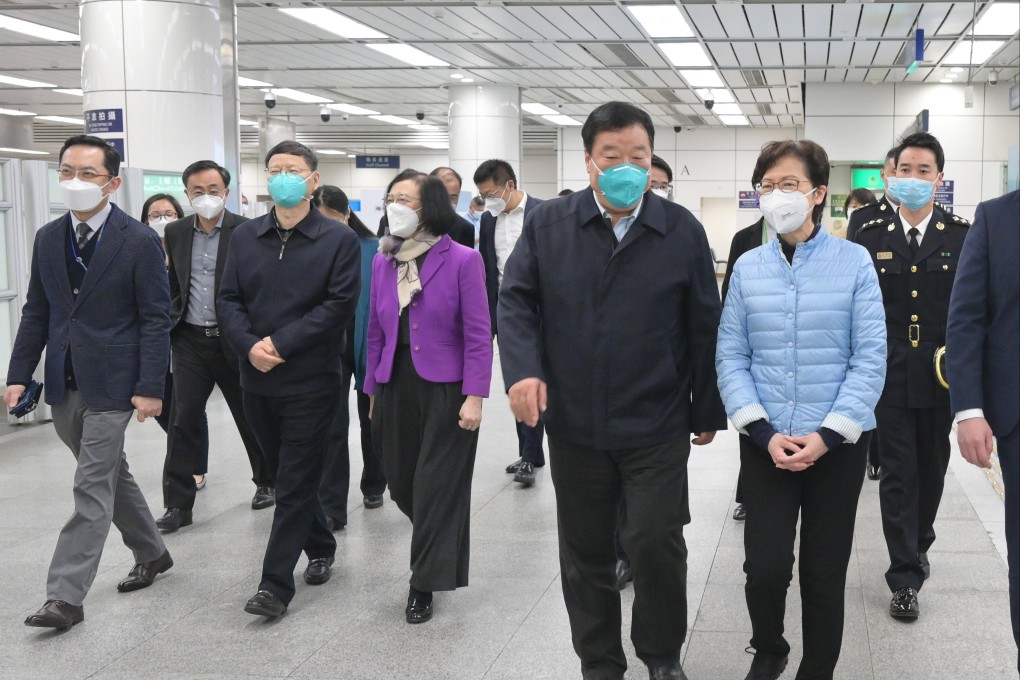Hong Kong Chief Executive Carrie Lam (second from right) with Dr Liang Wannian on Monday. Photo: Handout