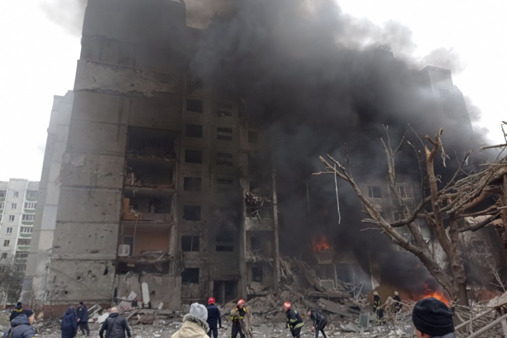 Ukrainian firefighters on Thursday work to extinguish a blaze at the damaged Chernigiv city centre after a Russian air raid. Photo: AP