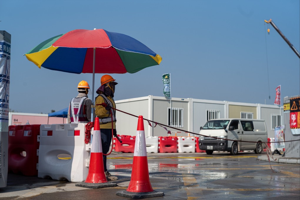 Construction work under way on a temporary Covid-19 isolation facility supported by the central government, near Hong Kong’s border with Shenzhen. EPA-EFE