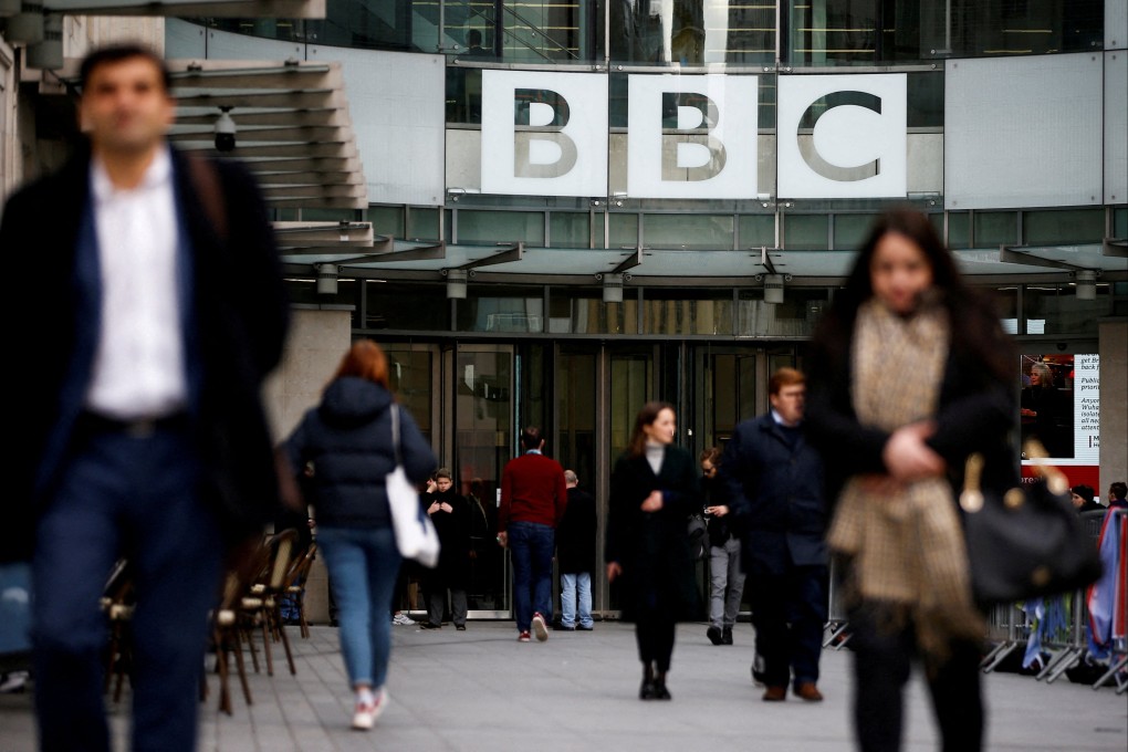 Pedestrians walk past a BBC logo at Broadcasting House in London in January 2020. Photo: Reuters