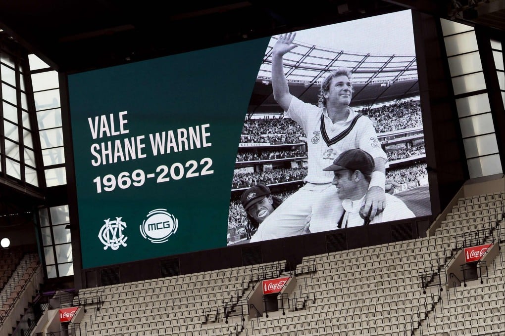 An image of Shane Warne looks out over the Melbourne Cricket Ground after it was announced the ground’s Great Southern Stand would be renamed. Photo: AFP