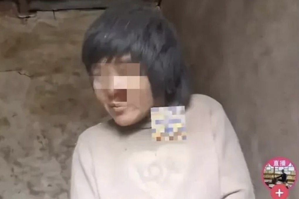 A video of a mother of eight who was chained to wall by her neck has gripped national attention in China and spurred proposals to toughen human trafficking laws. Photo: Hexun