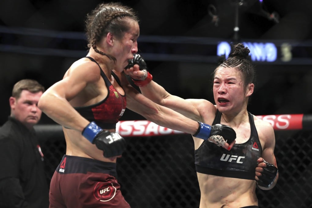 UFC women’s strawweight champion Weili Zhang (right) punches former champion Joanna Jedrzejczyk during UFC 248. Photo: AP