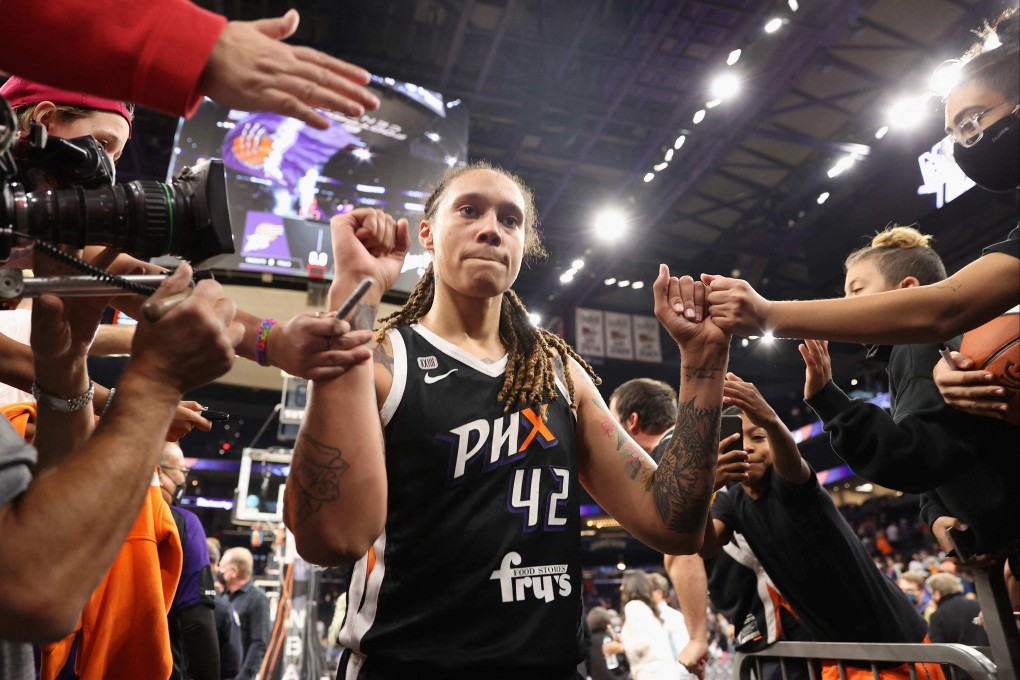 Phoenix Mercury’s Brittney Griner celebrates with fans after game two of the 2021 WNBA Finals. Photo: AFP