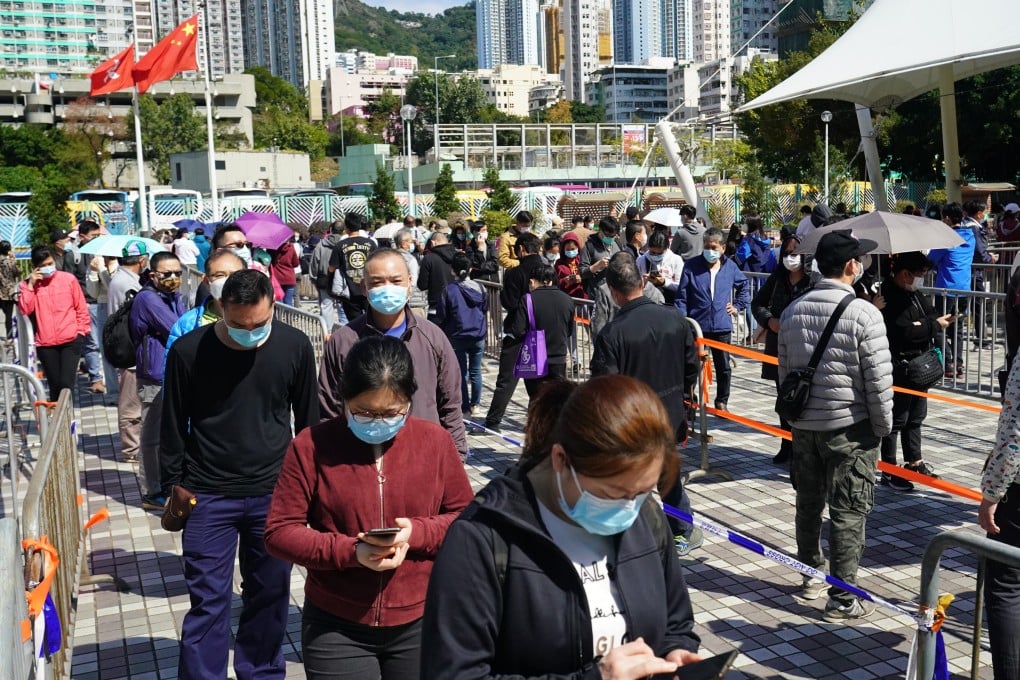 Residents queue up for Covid-19 testing at a mobile sample collection centre. Photo: Felix Wong