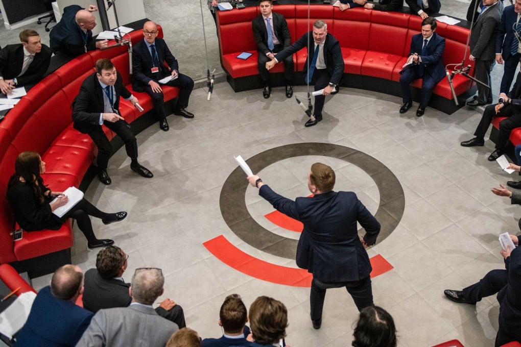 Traders, brokers and clerks on the trading floor of the open outcry pit at the London Metal Exchange, on February 28, 2022. Photo: Bloomberg