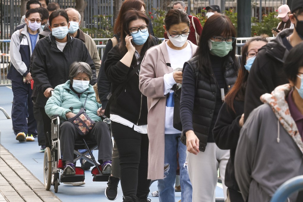 People queue for Covid-19 testing at a mobile specimen collection station in Victoria Park. Photo: K. Y. Cheng