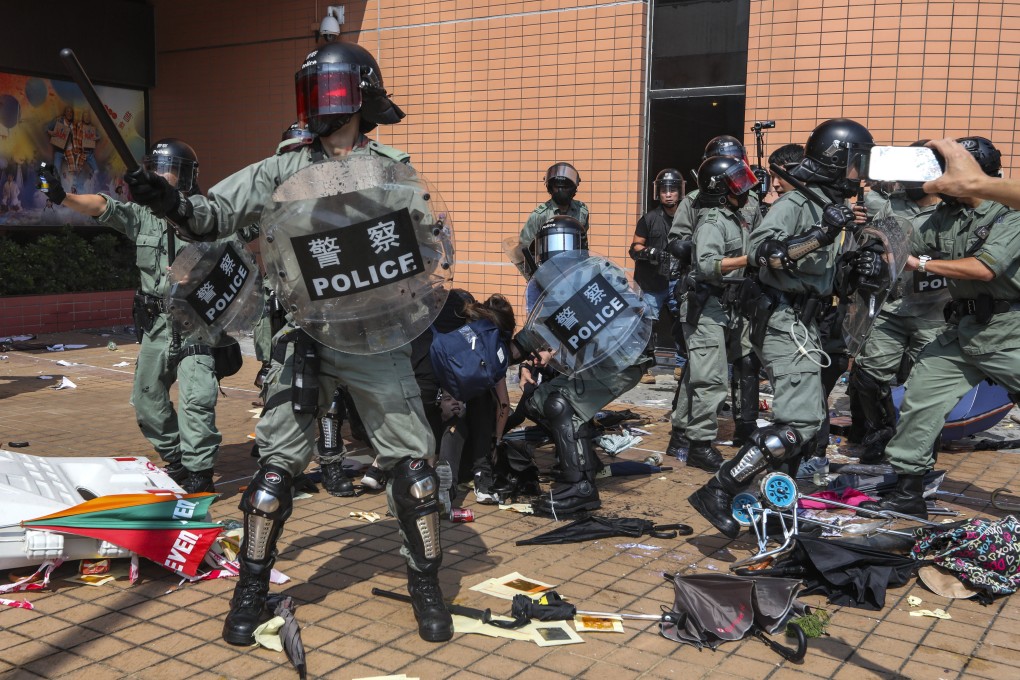 Riot police attempt to clear the area and make arrests during an anti-government protest in Tuen Mun on October 01, 2019. Photo: Xiaomei Chen