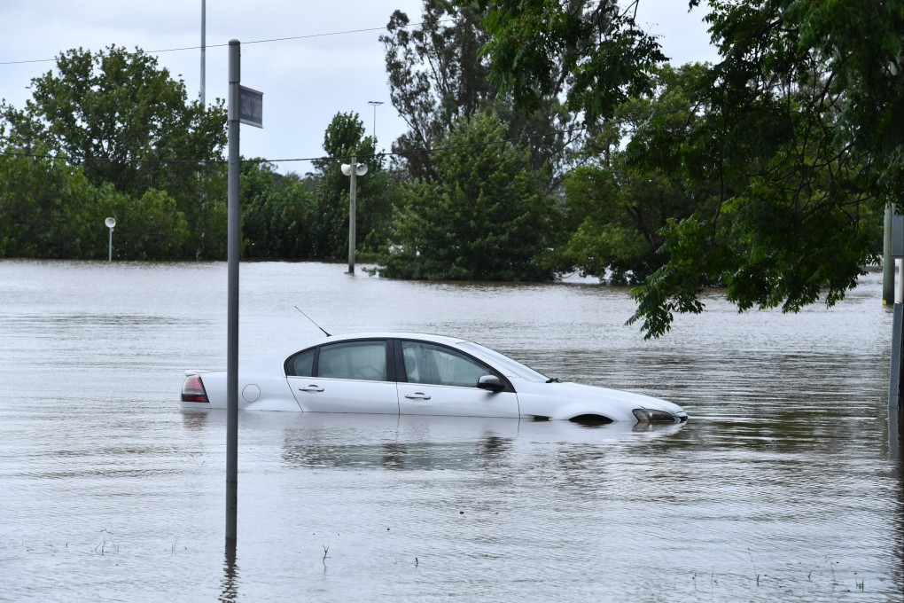 A car is seen on a flooded street in Sydney, Australia, on Tuesday. Photo: EPA-EFE
