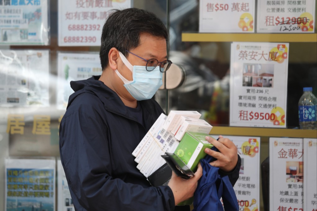 Residents stock up on rapid antigen test kits for Covid-19 in Sham Shui Po. Photo: Yik Yeung -man