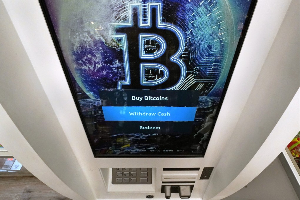 In this Feb. 9, 2021 photo, the bitcoin logo appears on the display screen of a cryptocurrency ATM in Salem, New Hampshire. Photo: AP