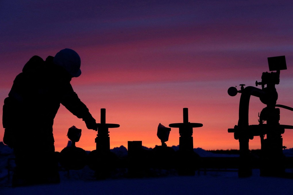 A worker checks the valve of a pipe at an oil field owned by Russian state-owned oil producer Bashneft in Bashkortostan, Russia. File photo: Reuters