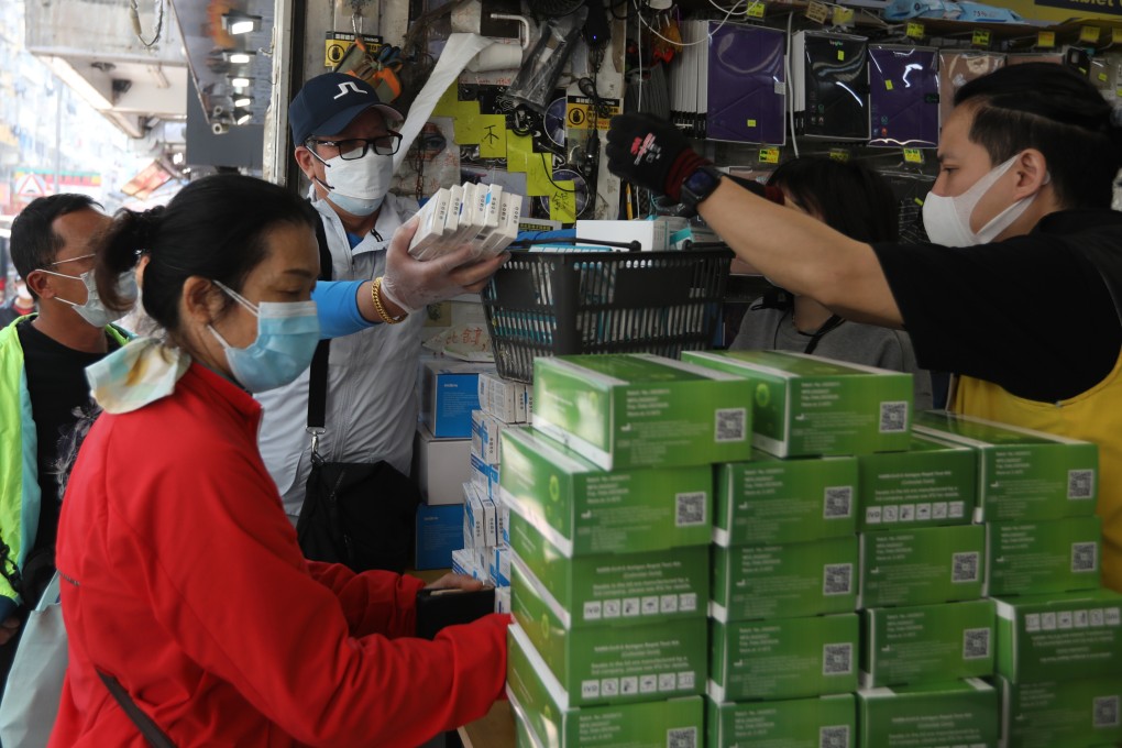 Residents buying rapid antigen test kits for Covid-19 at a shop in Sham Shui Po on March 5. Photo: Yik Yeung-man