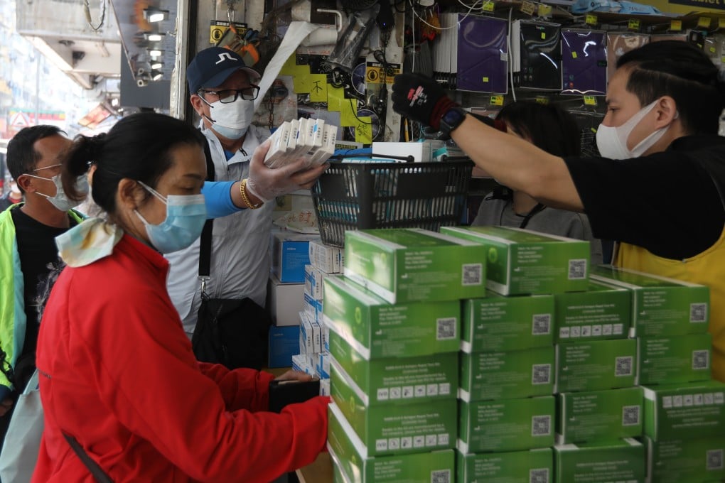 Residents buying rapid antigen test kits for Covid-19 at a shop in Sham Shui Po on March 5. Photo: Yik Yeung-man