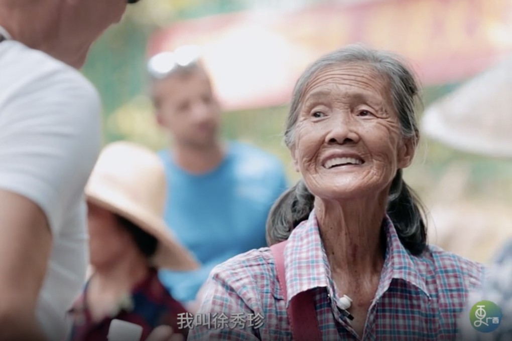 ‘Mama Moon’: tour guide, 77, teaches herself simple greetings in several languages. Photo:  Ergeng TV