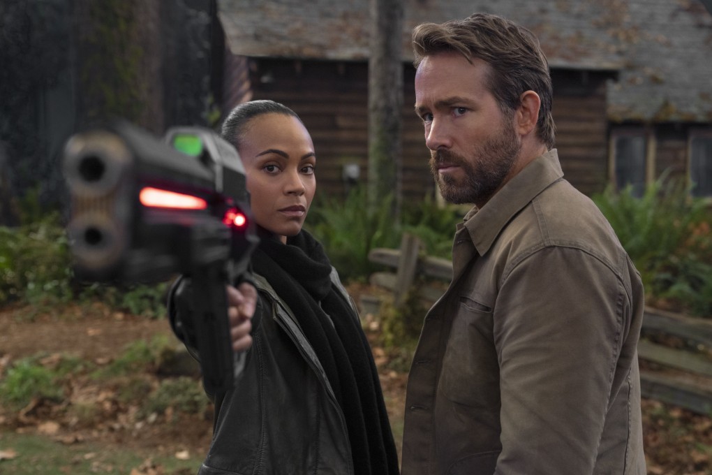 Zoe Saldana and Ryan Reynolds in a still from The Adam Project, directed by Shawn Levy. Walker Scobell and Mark Ruffalo co-star. Photo: Doane Gregory/Netflix