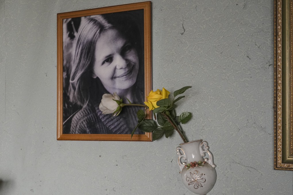 A photograph of 81-year-old Pjotr Vyerko’s wife, Lidya, who died from skin cancer believed to be caused by the 1986 Chernobyl nuclear disaster, on the wall of his home near Kyiv last week. Photo: AP