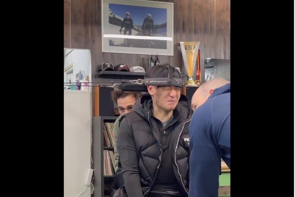 A screen grab from the video showing Chinese F1 driver Zhou Guanyu being trained to handle G-Force. Photo: Twitter/@ZhouGuanyu24