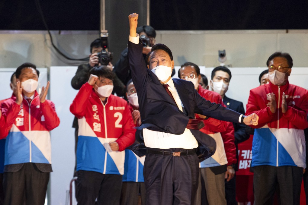 Yoon Suk-yeol, South Korea’s president-elect, reacts outside his campaign office in the National Assembly in Seoul, South Korea, on Wednesday. Photo: Bloomberg
