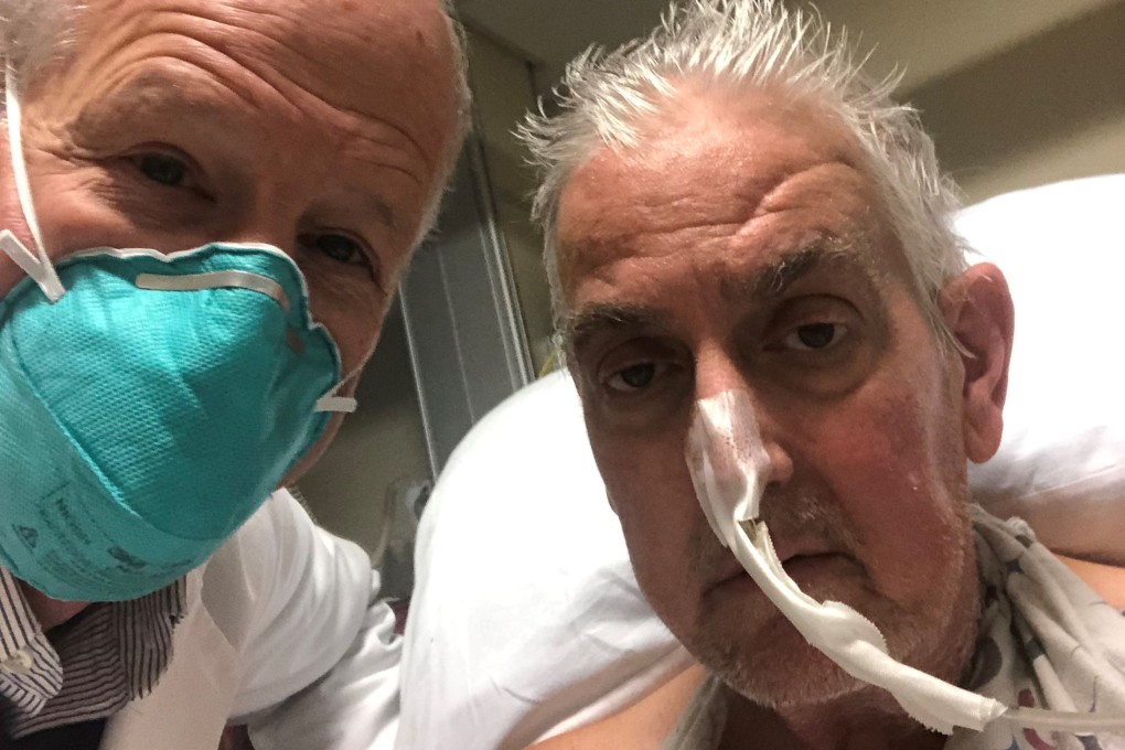 Surgeon Bartley P. Griffith poses with patient David Bennett before a successful transplant of a genetically modified pig heart at the University of Maryland Medical Centre in Baltimore in January. Photo: University of Maryland School of Medicine via EPA-EFE
