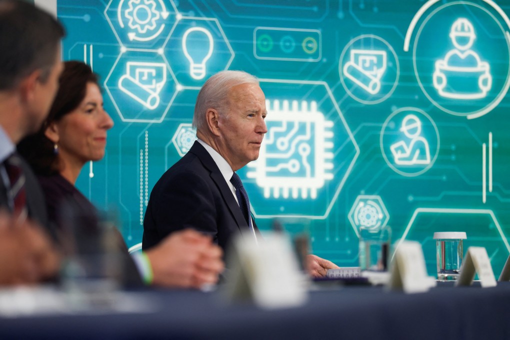 US President Joe Biden and Commerce Secretary Gina Raimondo hold a virtual meeting at the White House to discuss the chip industry, March 9, 2022. Photo: Reuters
