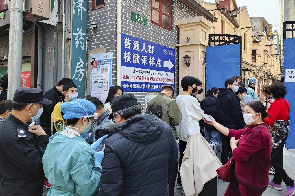 People line up for coronavirus tests outside a hospital in Shanghai. Photo: AP