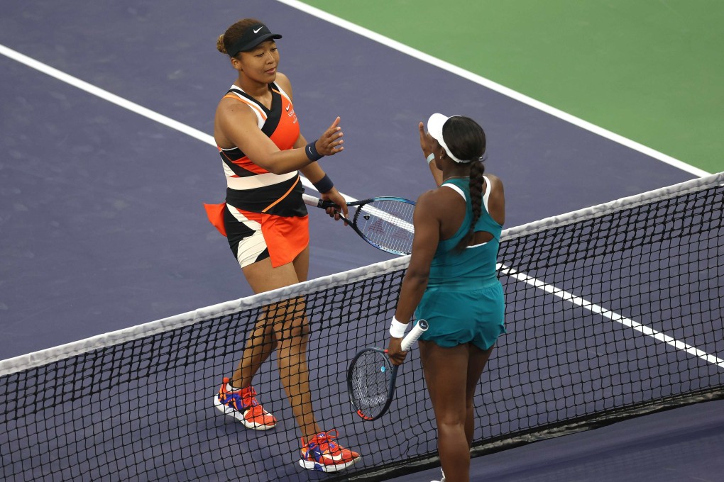 Naomi Osaka (left) shakes hands with Sloane Stevens after beating her in the first round of the BNP Paribas Open. Photo: AFP