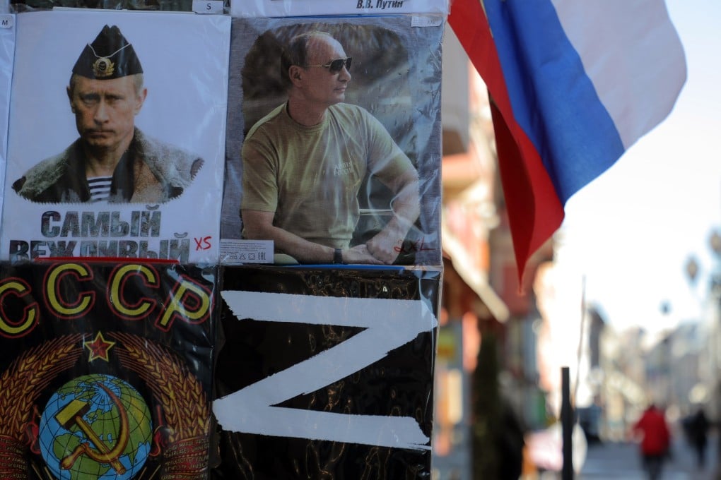 T-shirts with photos of Russian President Vladimir Putin and the ‘Z’ letter displayed at a souvenir shop in downtown Moscow, Russia. Photo: EPA