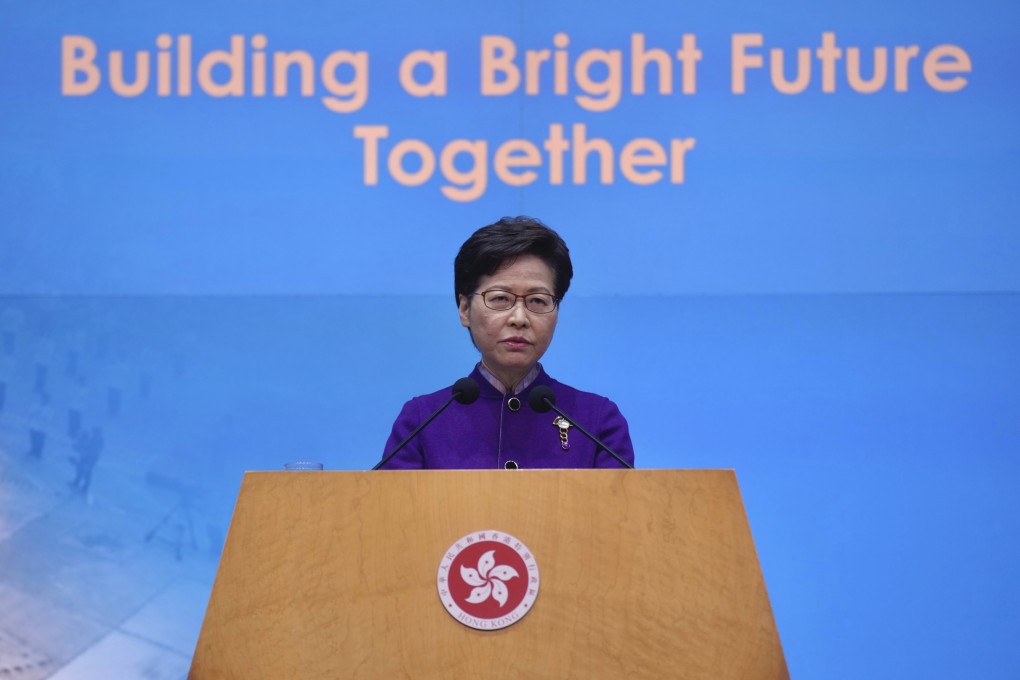 Hong Kong Chief Executive Carrie Lam listens to reporters’ questions during a press conference on December 20, 2021. Photo: AP