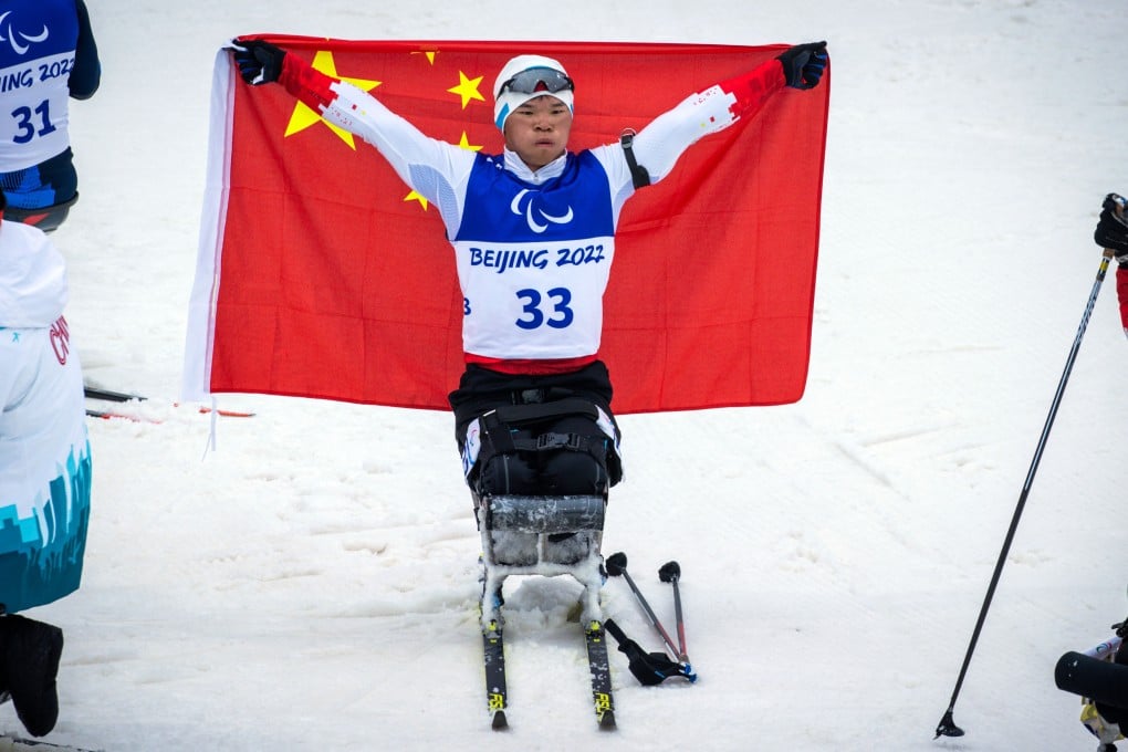 Liu Mengtao celebrates winning the gold medal after the men’s para biathlon 12.5km sitting event. Photo: dpa