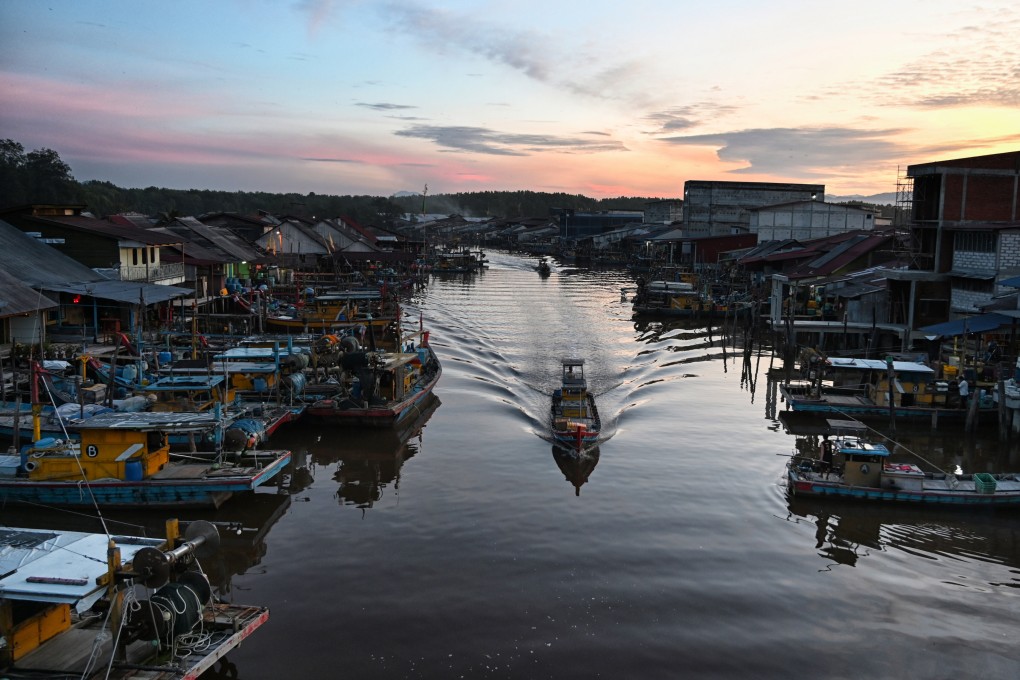 Sunrise over Kuala Sepetang, Malaysia. A former centre of tin mining in a mangrove reserve, its tourist attractions include dancing fireflies at night and traditional charcoal factories. Photo: Philippe Durant