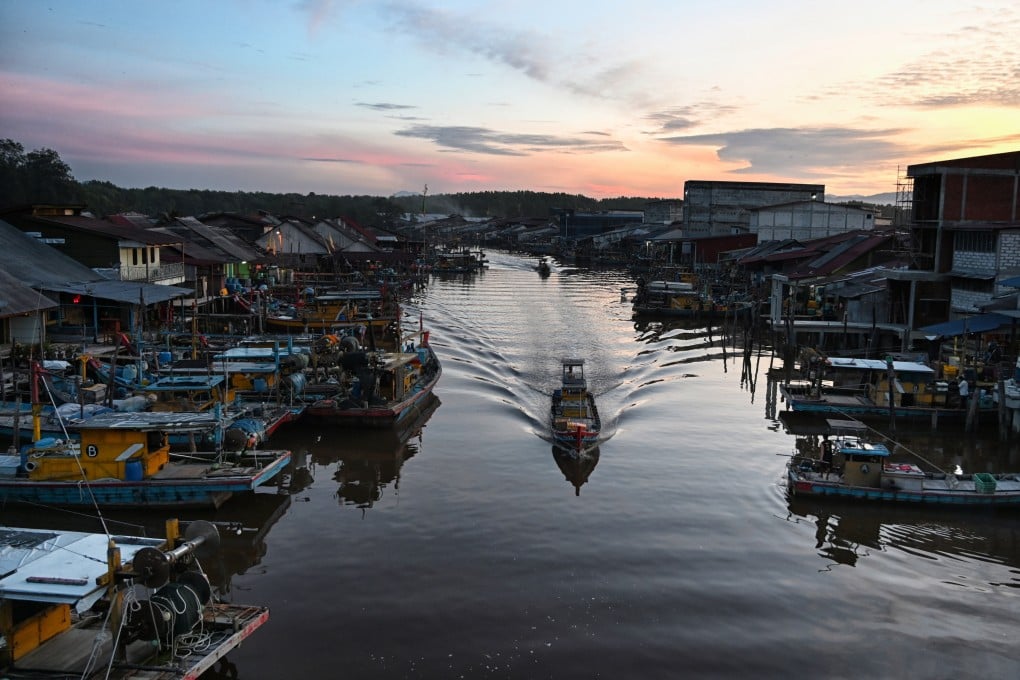 Sunrise over Kuala Sepetang, Malaysia. A former centre of tin mining in a mangrove reserve, its tourist attractions include dancing fireflies at night and traditional charcoal factories. Photo: Philippe Durant