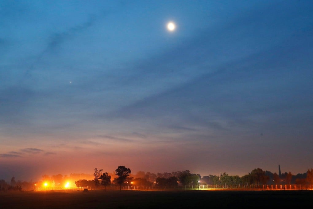 The illuminated fenced border between India and Pakistan is pictured at village in Ranbir Singh Pura sector near Jammu in March. The two nuclear-armed neighbours have fought three wars and have engaged in numerous military clashes. Photo: Reuters
