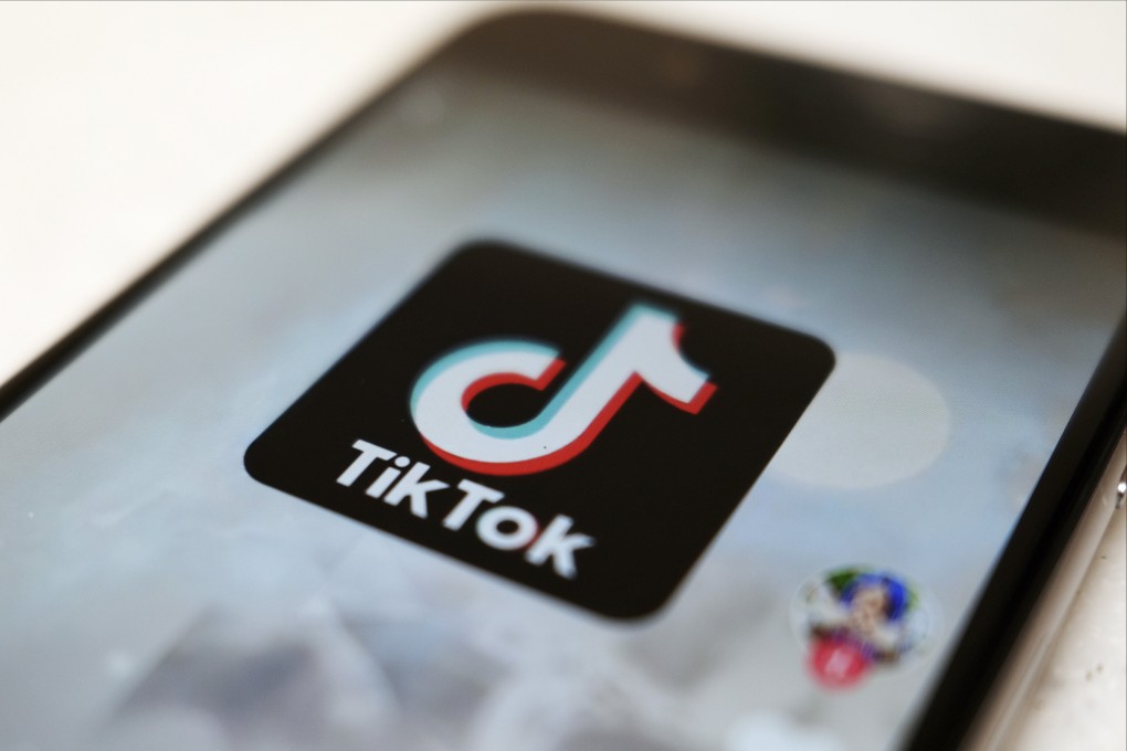 The logo for TikTok is displayed on a smartphone screen. Photo: AP