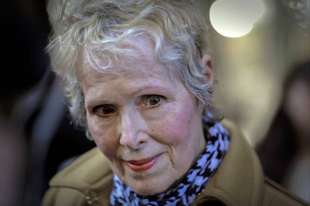 Writer E. Jean Carroll listens as she meets reporters outside a courthouse in New York in March 2020. Photo: AP