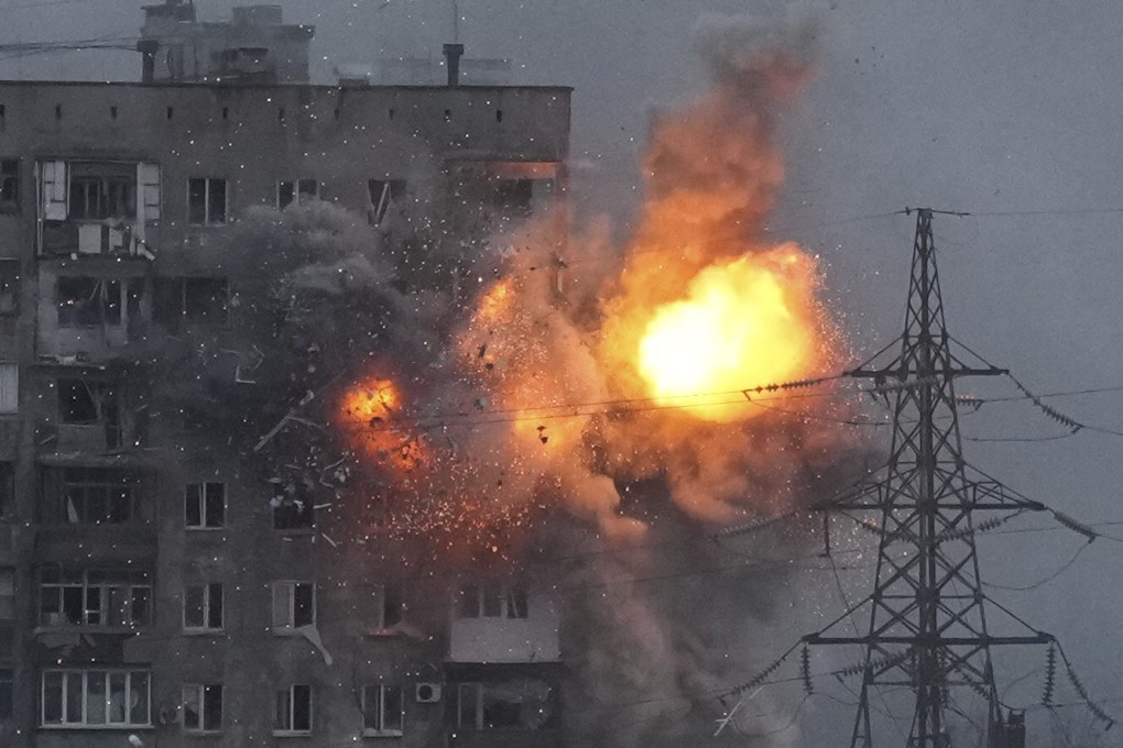 An explosion in a building that came under fire from a Russian army tank in Mariupol, Ukraine. Photo: AP