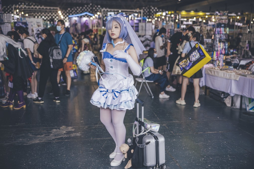 A teenage girl wearing cosplay costumes attends the China International Cartoon and Games Expo in Shanghai, 16 July 2021. Photo: EPA-EFE