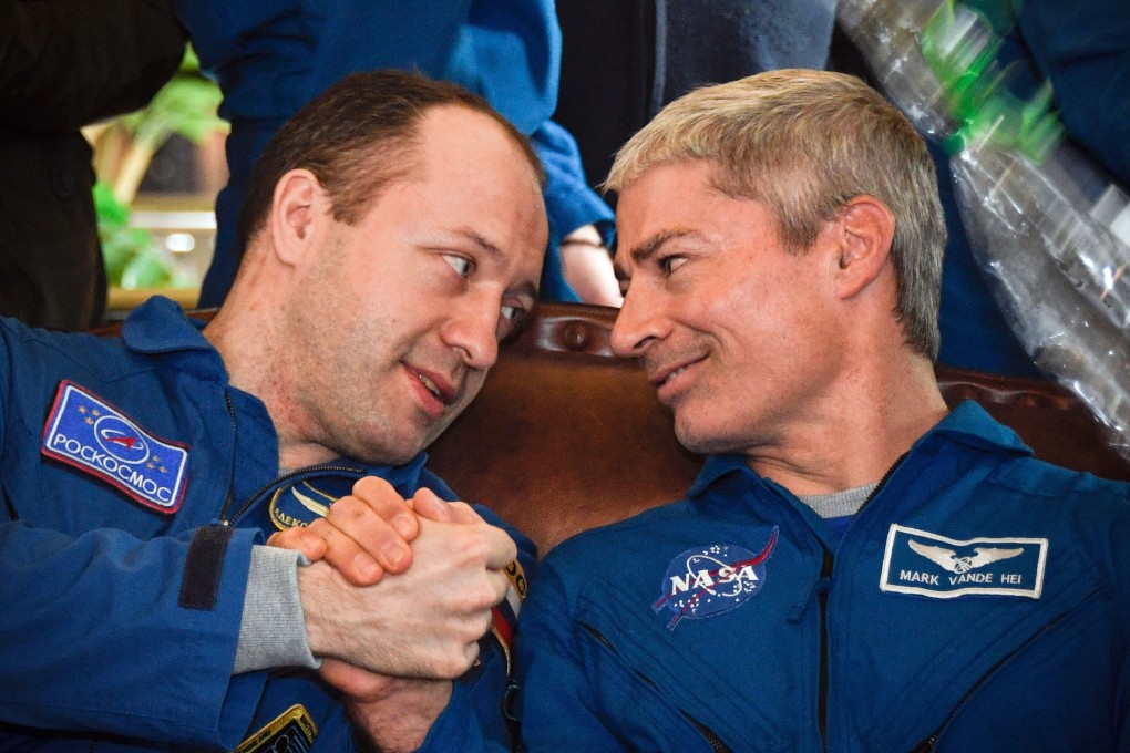 US astronaut Mark Vande Hei, right, and Russian cosmonaut Alexander Misurkin in 2018. Photo: AFP via Getty Images / TNS