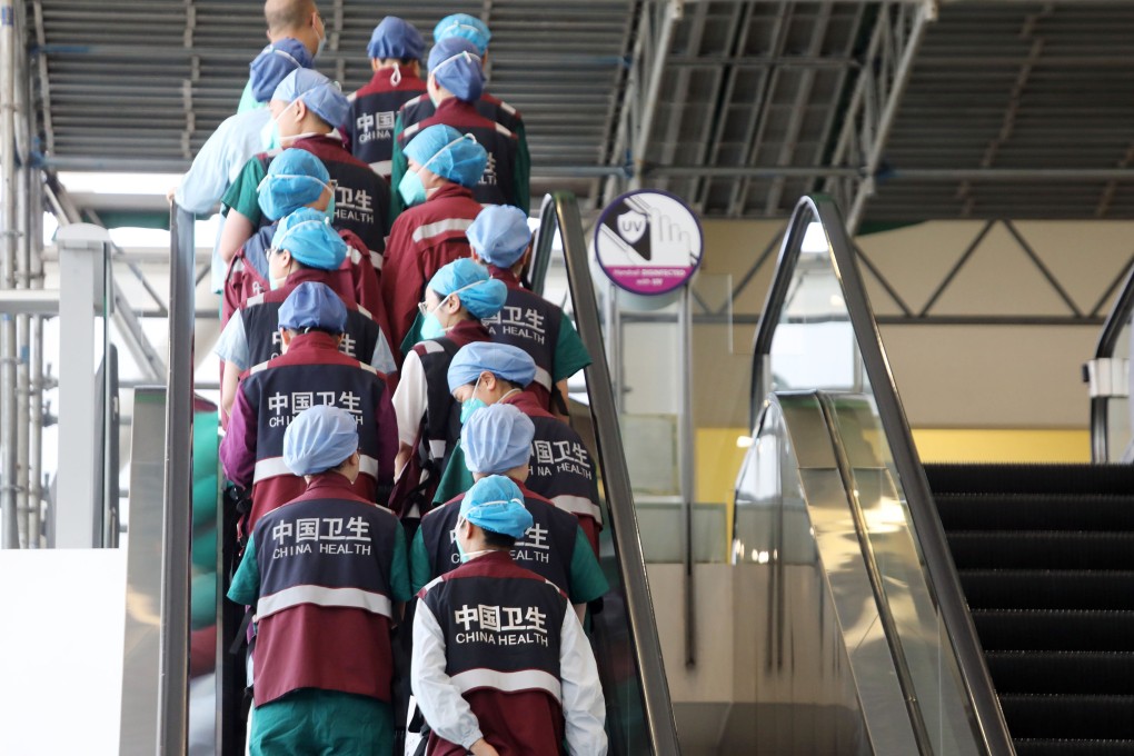 Medical practitioners from Guangdong province arrive at AsiaWorld-Expo on Tuesday to treat coronavirus patients. Photo: Jelly Tse