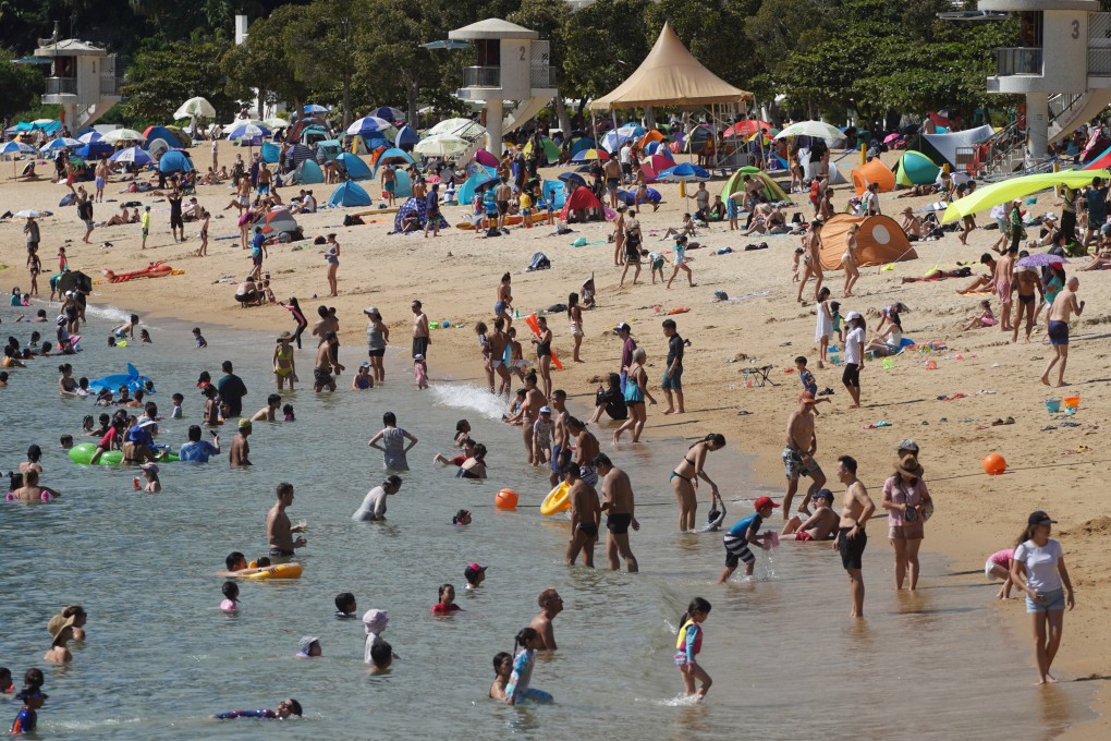 Hong Kong’s crowded public beaches amid the fifth wave of the coronavirus have drawn scorn across the border, where residents are under strict lockdowns. Photo: Winson Wong