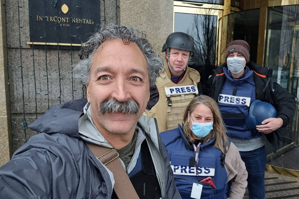 Cameraman Pierre Zakrzewski (left) posing with colleagues at the Kyiv Intercontinental Hotel. Photo: Fox News via AFP