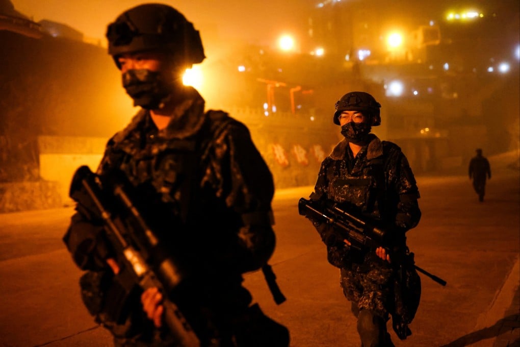 Night patrol in Dongyin, which sits on an important passage for any southbound PLA forces. Photo: Reuters