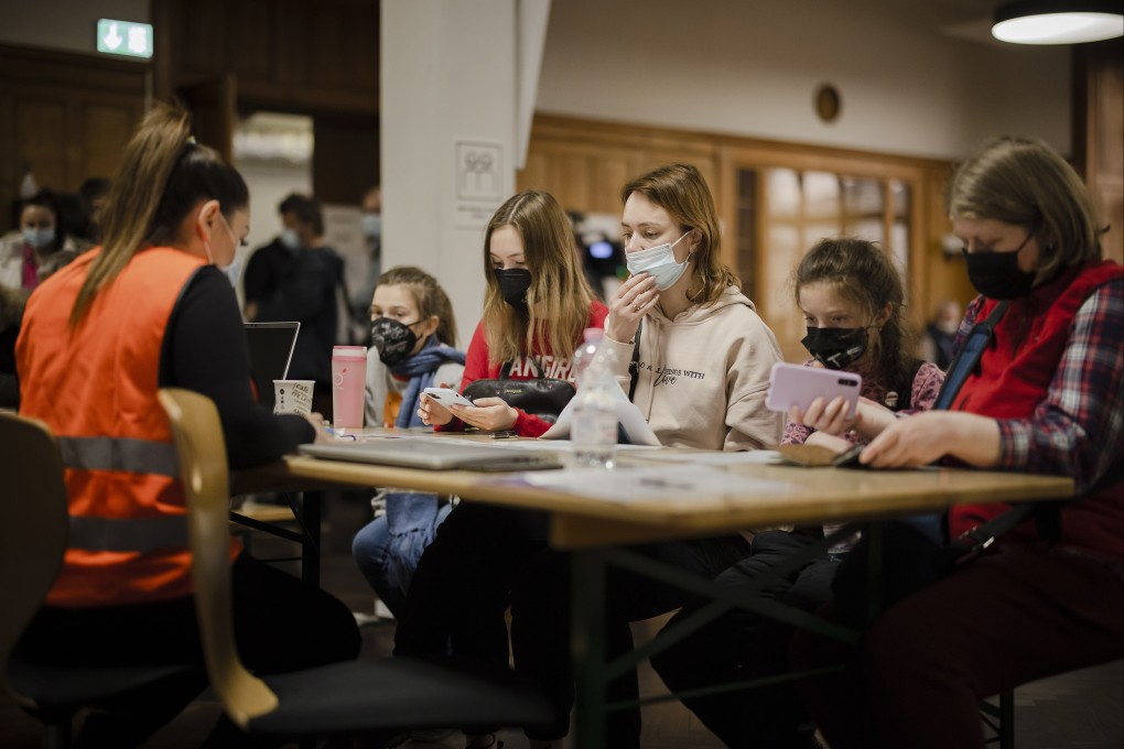 A familiy from Ukraine registers at the reception centre for refugees in Zurich, Switzerland, on March 15. According to figures released by the United Nations High Commissioner for Refugees, more than 2.9 million refugees have fled Ukraine since Russia began its military invasion on February 24. Photo: EPA-EFE