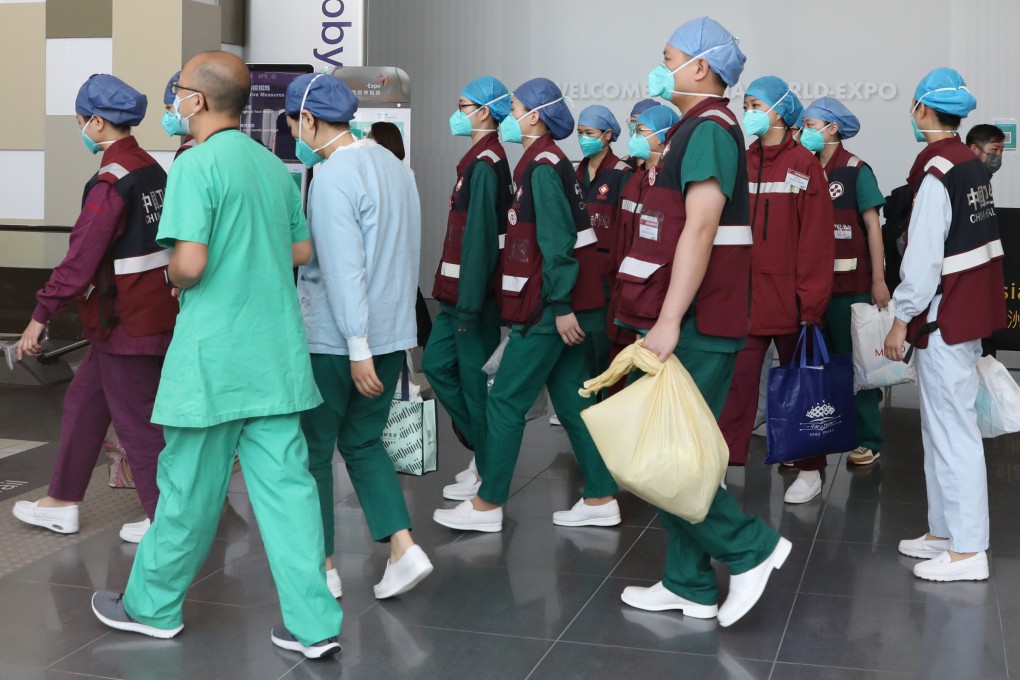Medical staff from Guangdong province arrive at AsiaWorld-Expo in Hong Kong. Photo: Jelly Tse