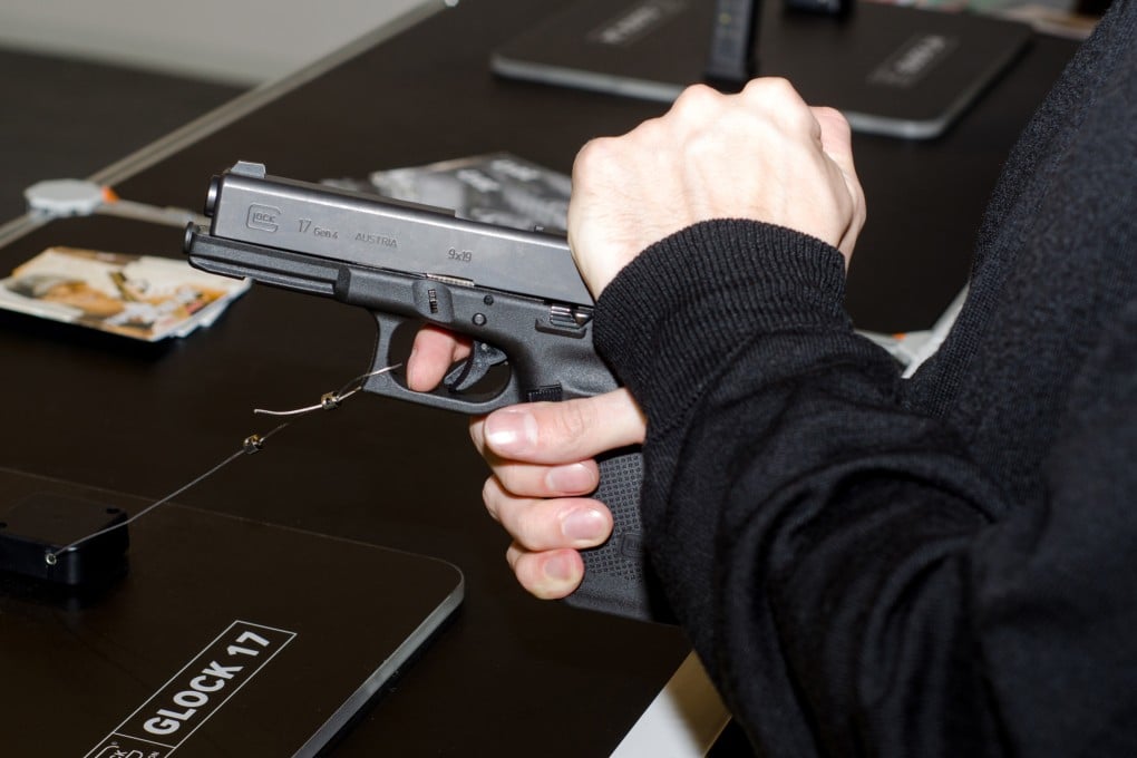 A Glock 17 pistol is seen at an exhibition. Fan Yang bought two pistols for his wife’s employer, claiming they were for himself. Photo: Shutterstock