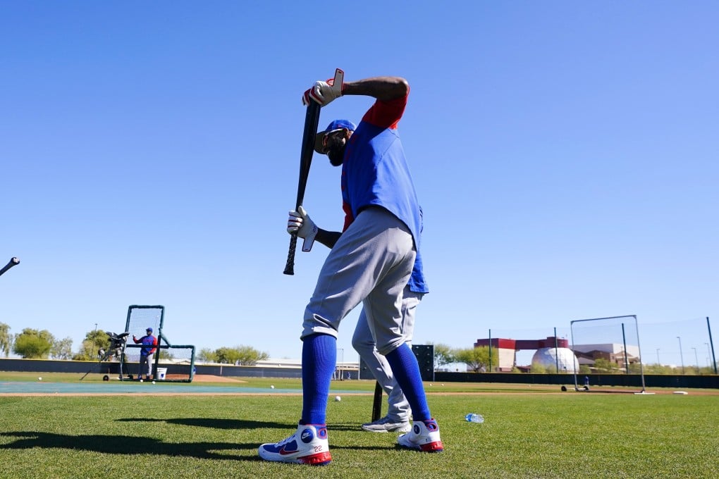 Chicago Cubs’ Jason Heyward stretches as he waits for his turn at batting practice during a baseball spring training workout. Photo: AP