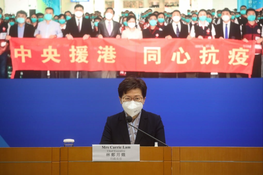 Hong Kong Chief Executive Carrie Lam has promised to review the social-distancing rules and quarantine requirements for travellers. Photo: Pool