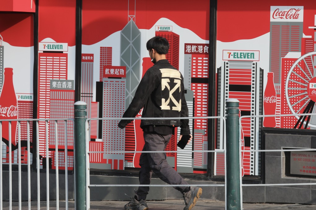 A pedestrian passes a mural of the Hong Kong skyline in Jordan. Photo: Xiaomei Chen