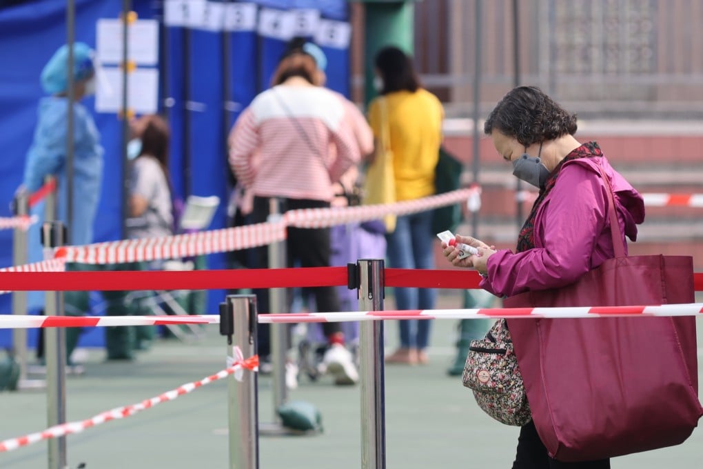 Residents and workers subject to compulsory testing queue up for Covid-19 screening in Sai Kung. Photo: May Tse