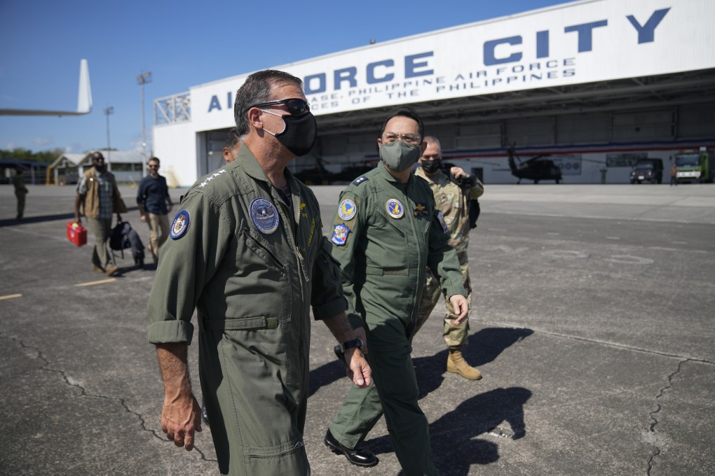 Admiral John C Aquilino, left, Commander of the US Indo-Pacific Command, arrives at Clark Air Base, Pampanga province, Philippines on March 20. Photo: AP